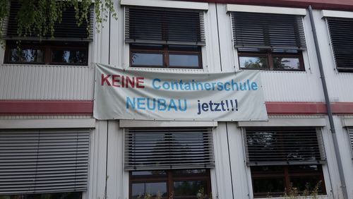 Plakat: Keine Containerschule